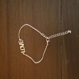 Goldtone Love bracelet with extender chain